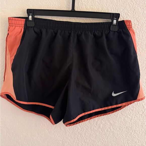 Nike Black and Orange Athletic Shorts with Curved Hem - Picture 1 of 7
